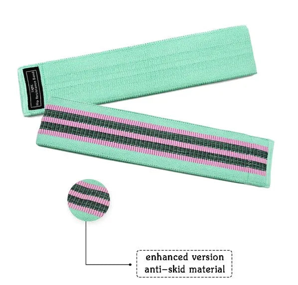 Set of three fabric resistance bands in lake blue, pink, and purple with a white storage net bag.