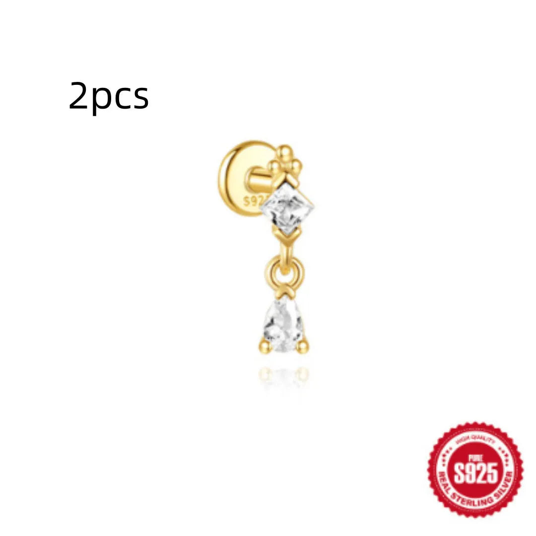 S925 sterling silver water drop shaped earrings with a flat spiral geometric design on a white background.