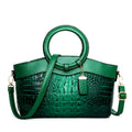 Ladies fashion handbag in multiple colours showing zipper compartments and shoulder strap
