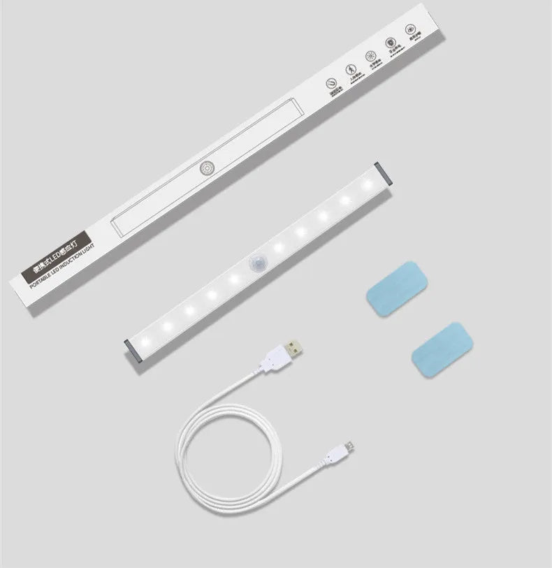 Silver aluminium magnetic LED closet light with motion sensor and USB charging port.
