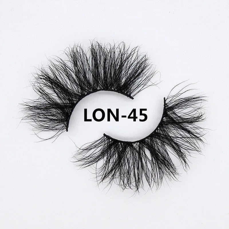 Real mink hair false eyelashes in 25MM3D length with fluffy handmade lash strands on a white background