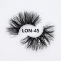 Real mink hair false eyelashes in 25MM3D length with fluffy handmade lash strands on a white background