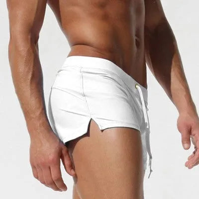 Cotton men sports shorts boxers in white, blue, navy, purple, green, and black for swimwear and beach use.