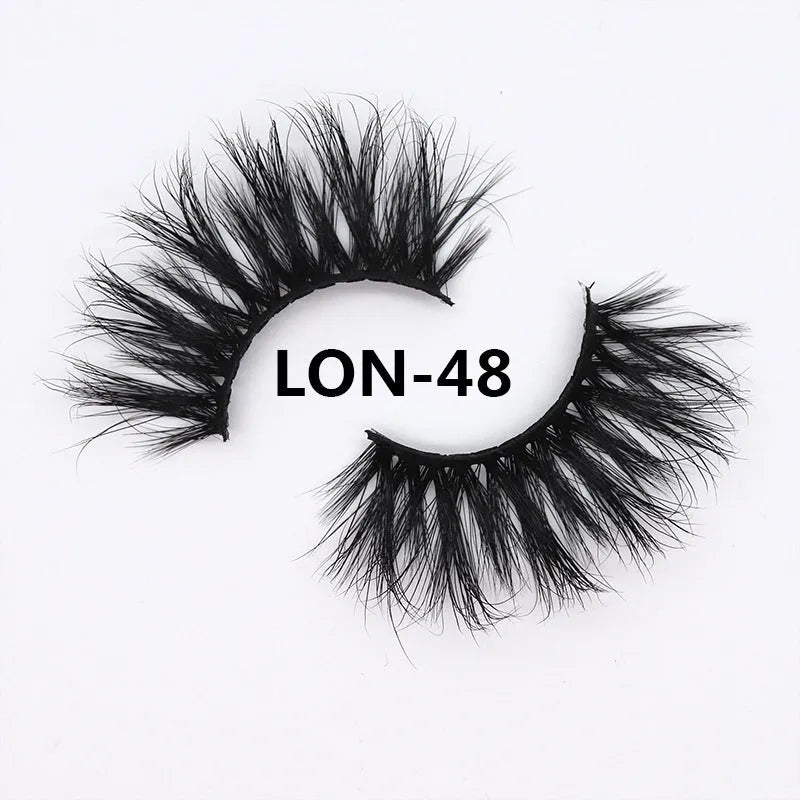 Real mink hair false eyelashes in 25MM3D length with fluffy handmade lash strands on a white background