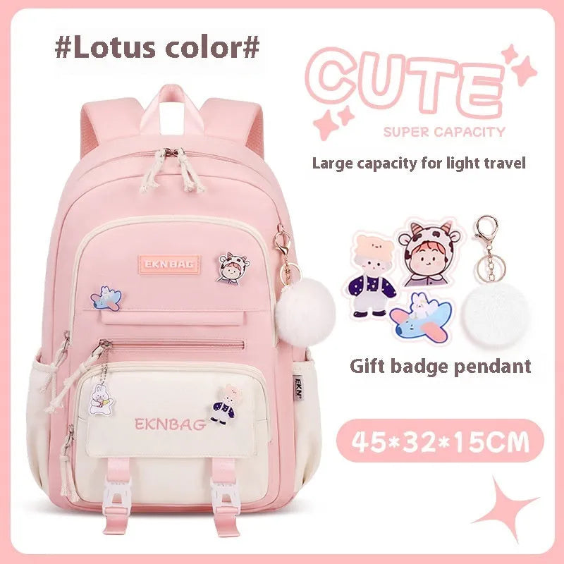 Girls' pink waterproof Oxford cloth school backpack with curved shoulder straps.