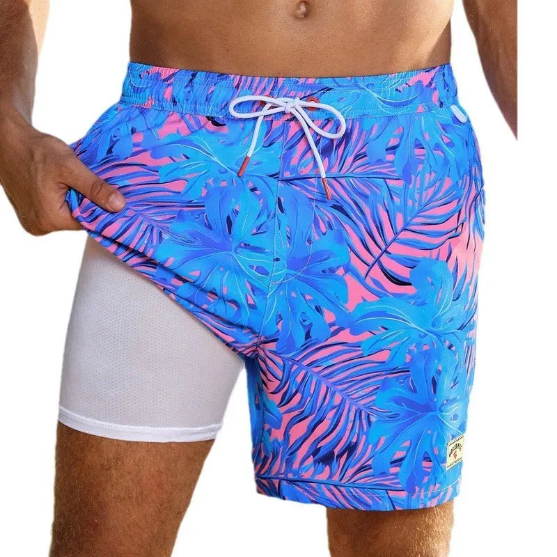 Men's loose fit quick-drying boxer swimming trunks in a selection of floral and tropical print designs.