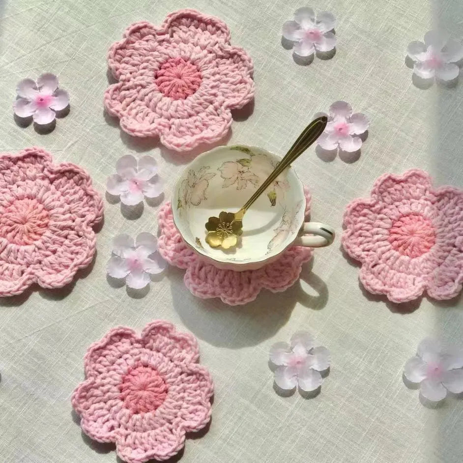 Hand-woven wool drink coasters available in sets of one, two, or six pieces.