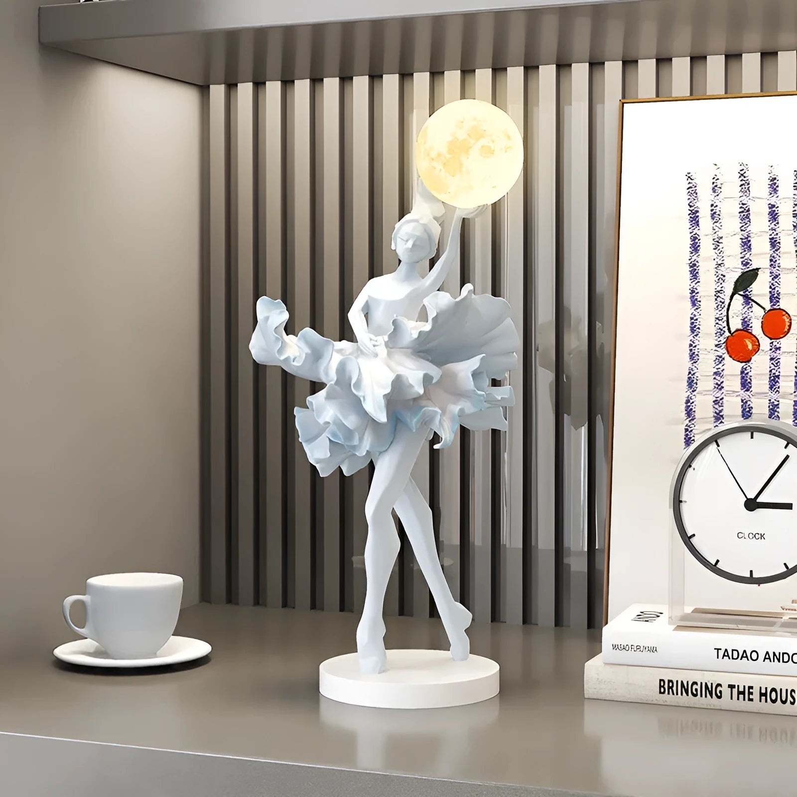 Ballet dancer resin night lamp in pink placed on a hallway table