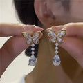 Platinum colour bow stud earrings with electroplated zinc alloy construction