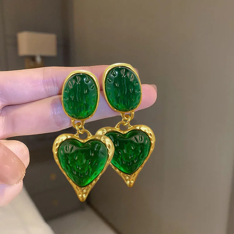 Pleated oval love heart stud earrings in purple, red, green, and yellow white colours with butterfly backs