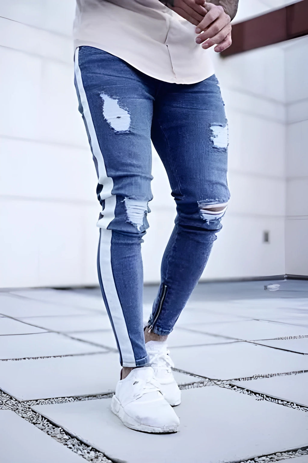 Men's ripped nostalgic light blue cotton-spandex straight leg jeans with zipper fly, front view