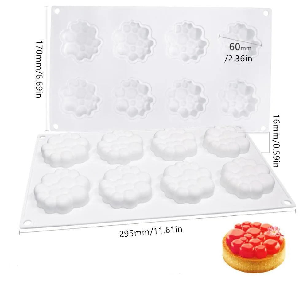Round silicone cake mould with 8 raised bubble towers for tiered desserts.