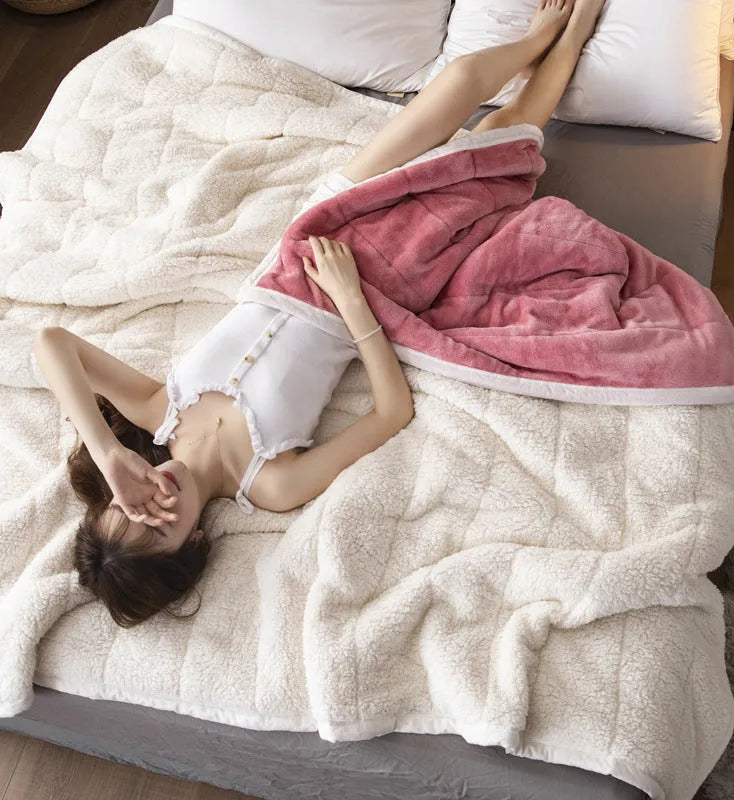 Avocado green coral fleece blanket folded to show its thick texture and 150x200cm size.