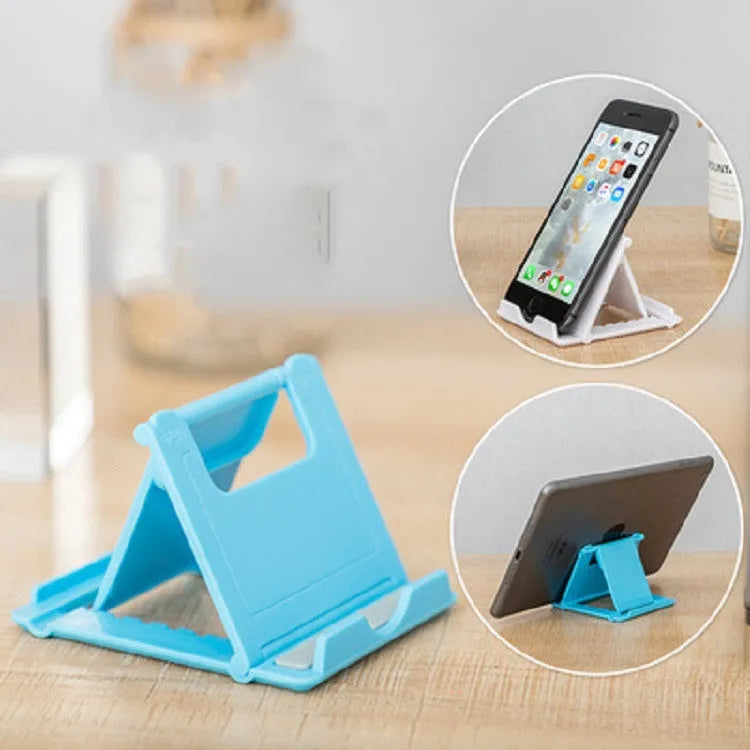 Multifunctional folding ABS stand for mobile phones and tablets, shown folded and in black colour