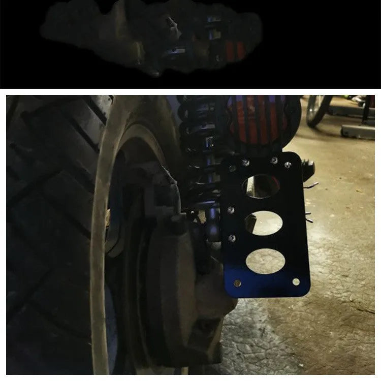 Black aluminium motorcycle side direction taillight and licence plate bracket with seven-fin design