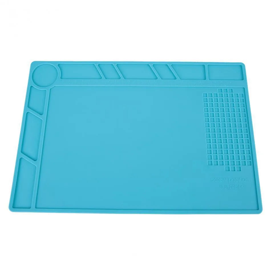Blue silicone rubber watch repair table mat for anti-skid workspace stabilisation.