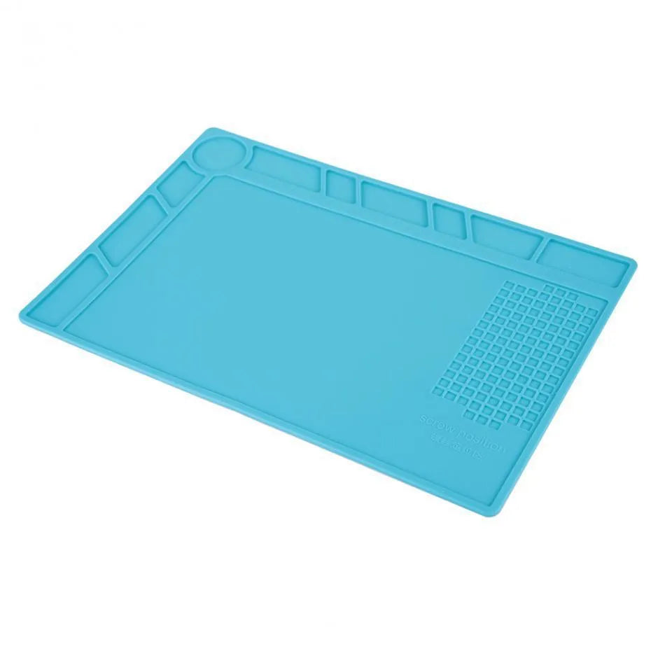 Blue silicone rubber watch repair table mat for anti-skid workspace stabilisation.