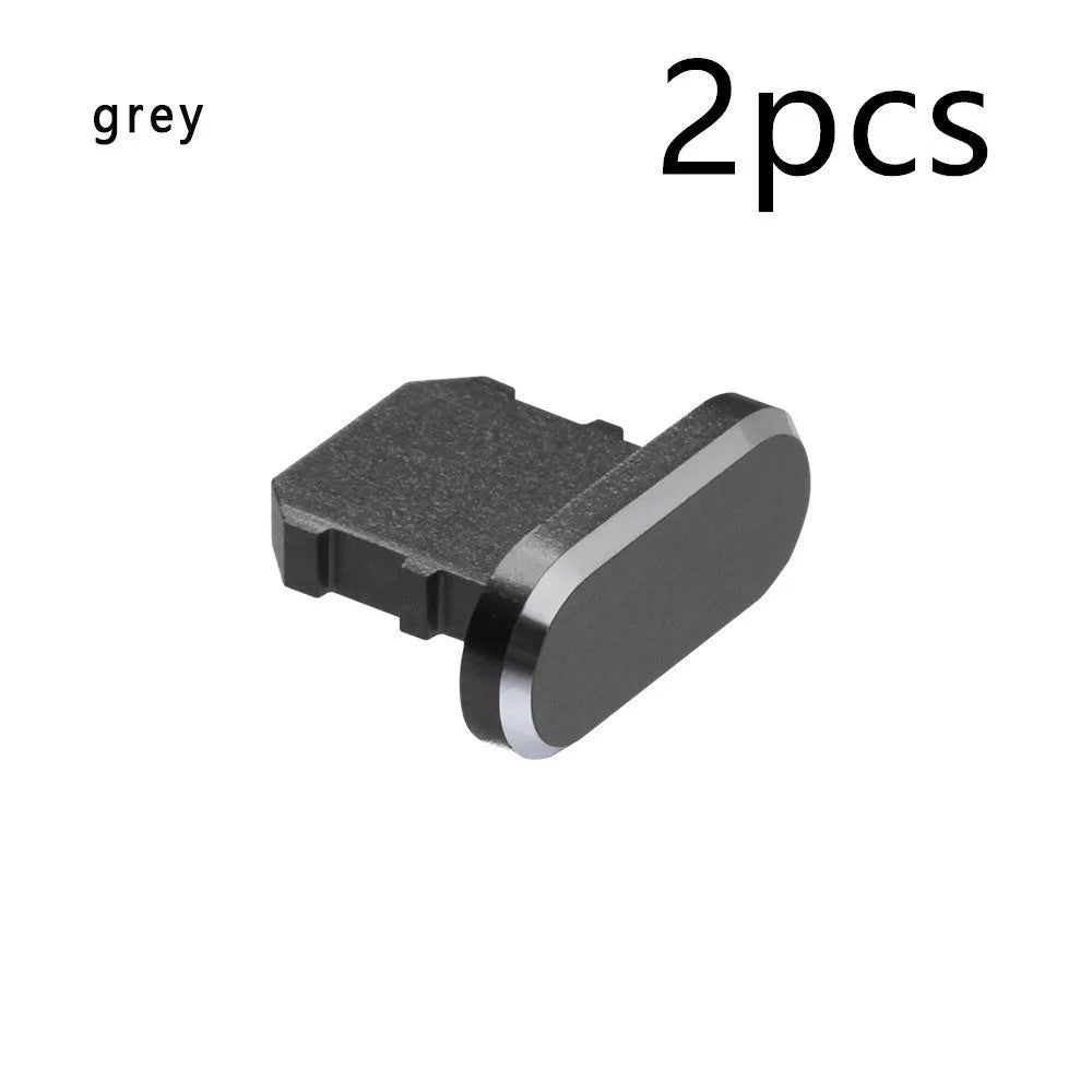 Aluminium alloy charging port dust plug for iPhone in various colours including gold, black, and rose gold.