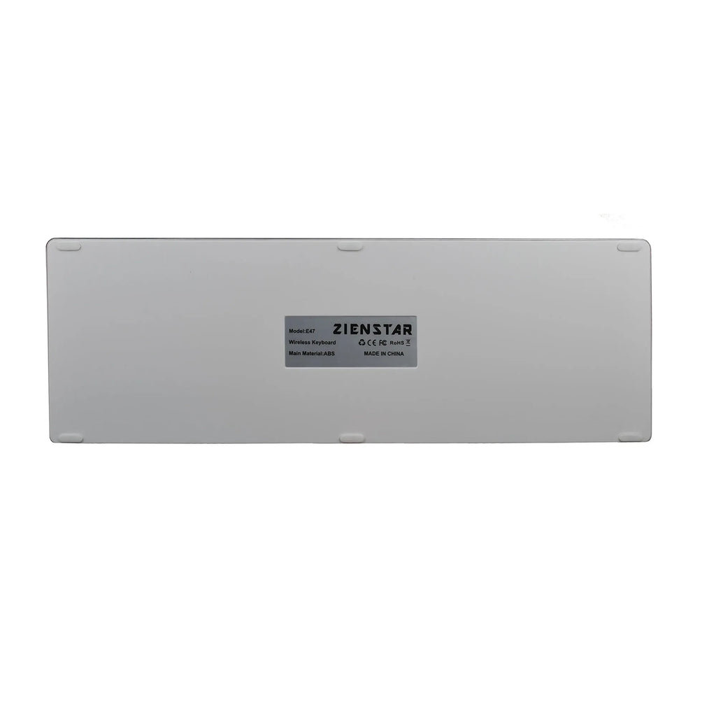 Slim white universal Bluetooth keyboard for tablets and mobile phones on a grey background