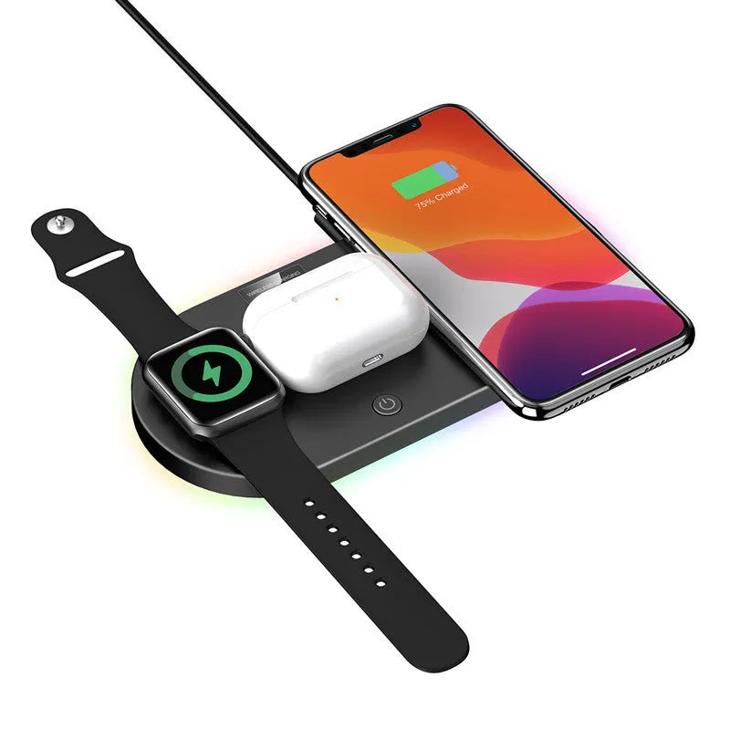 Black and white 15W fast desktop wireless charger with LED indicator on a desk