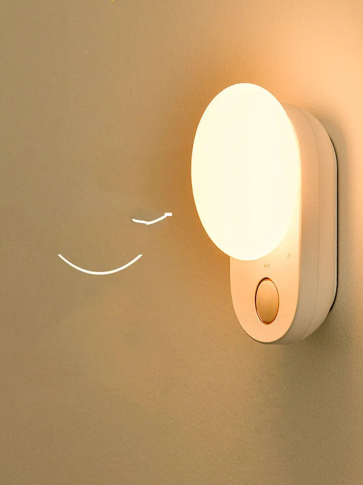 White Baseus Sunshine Series rechargeable sensor night light on a surface.