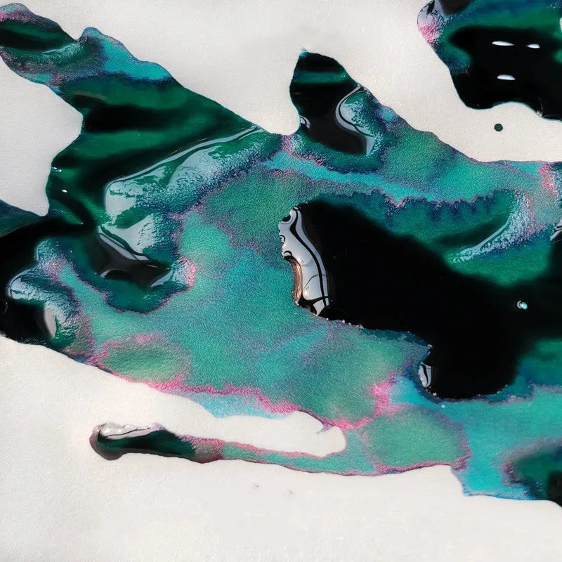 Gold powder colour ink bottle for fountain pens with sheen gradient effect.