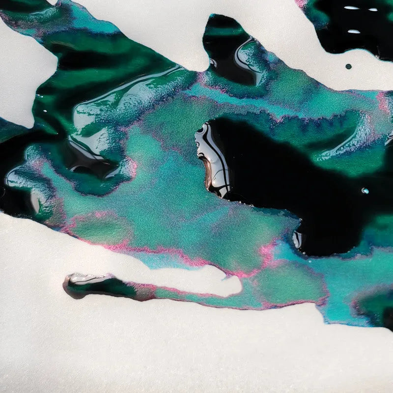 Gold powder colour ink bottle for fountain pens with sheen gradient effect.