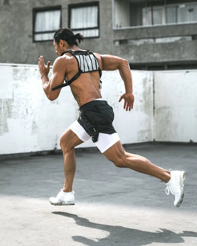 Men's quick-drying double-layer fitness shorts in Army Green with loose fit and moisture-wicking polyester fabric