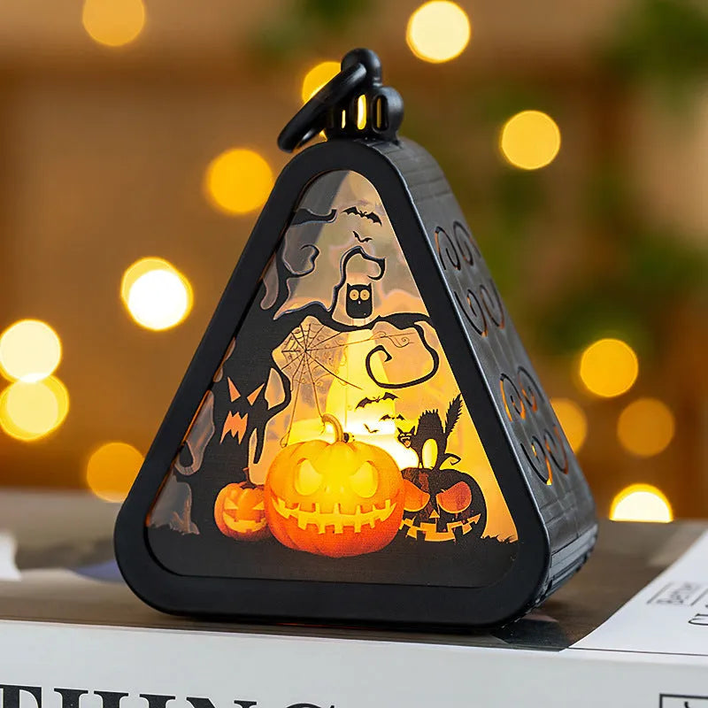 A portable Halloween decoration pumpkin lamp prop in plastic and glass, showing scale against a measuring tape.