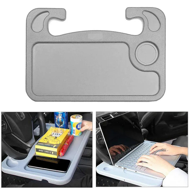 Multifunctional car desk in grey ABS with full suspension structure mounted on a car steering wheel, showing the adjustable angle handle