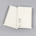 Creative coil-bound notebook showing grid, line, and dot ruling options in three different sizes