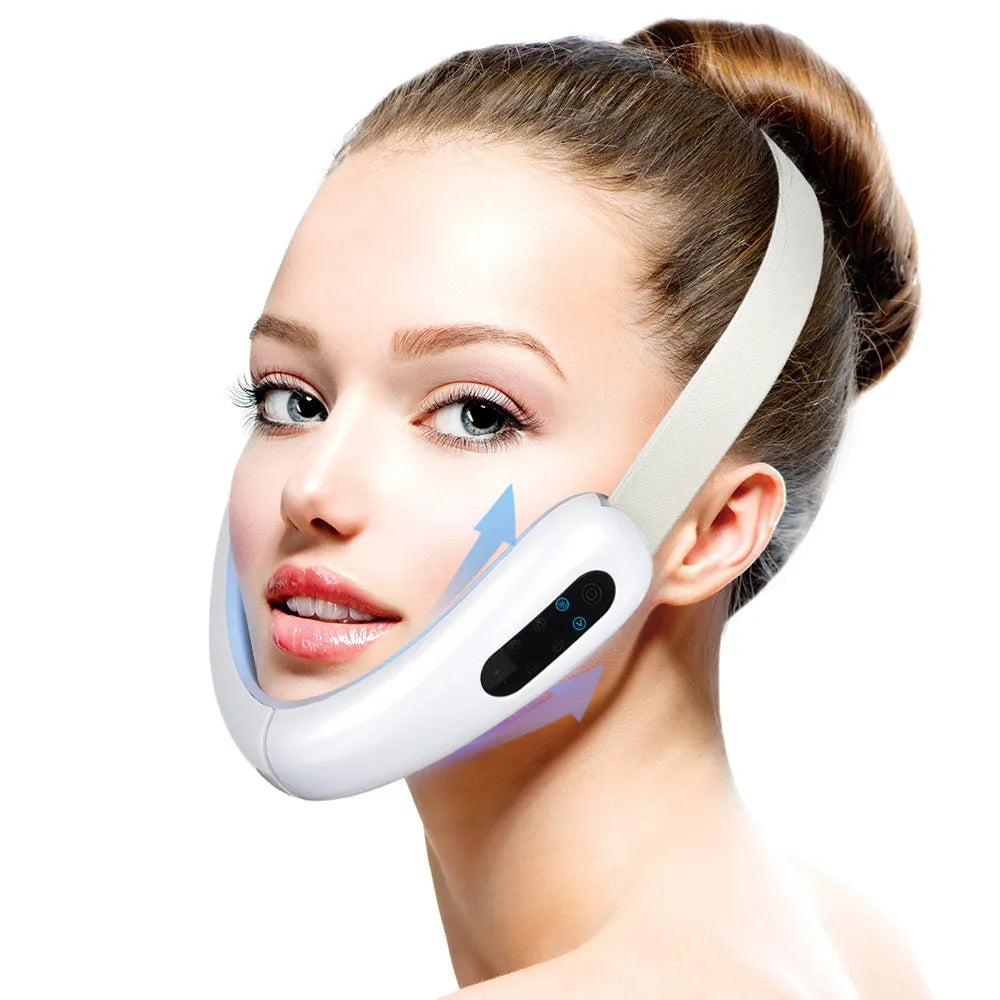 Micro-current IPL facial lifting massager in pink with six modes, adjustable V angle, and USB charging cable