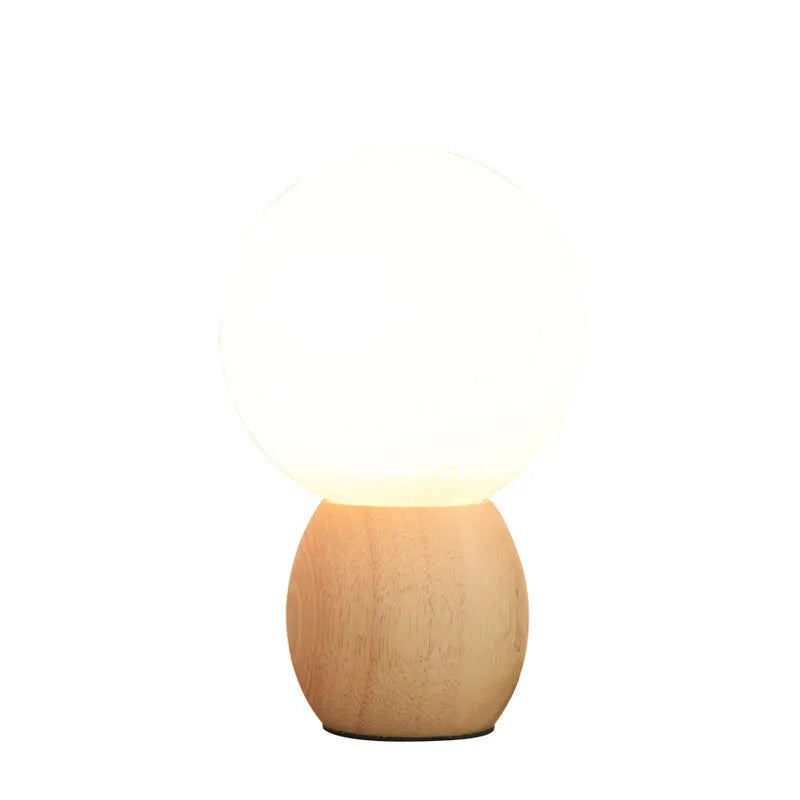 Large glass ball table lamp with Nordic design and push button switch for bedside or study use