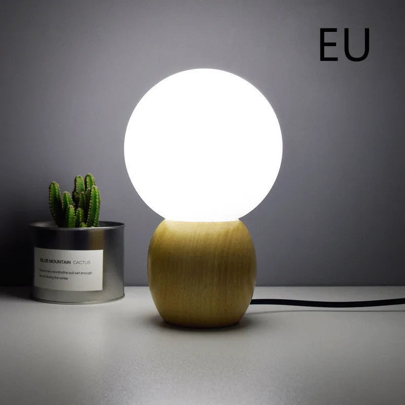 Large glass ball table lamp with Nordic design and push button switch for bedside or study use