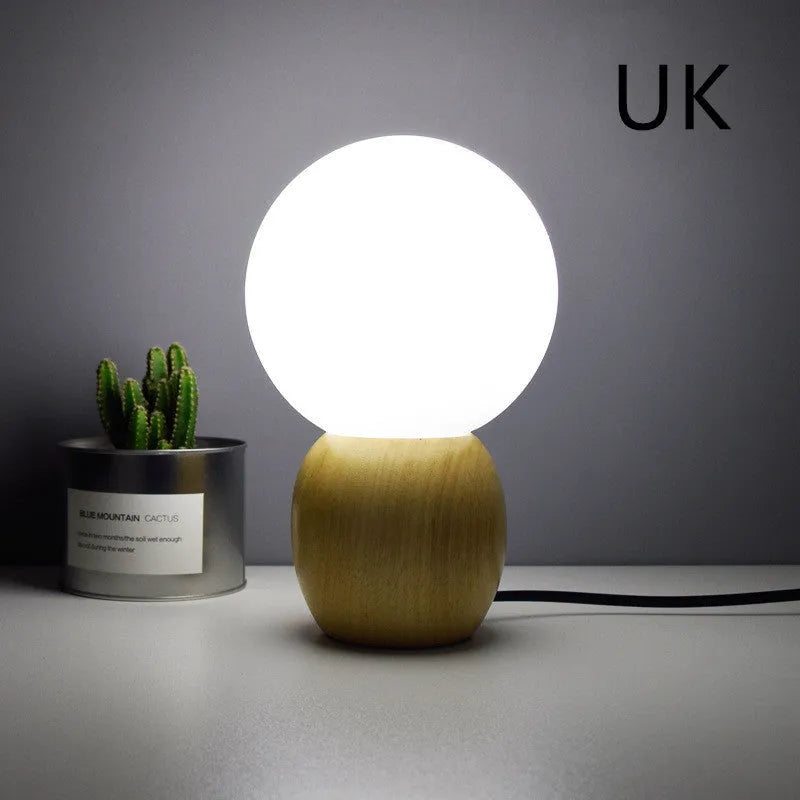 Large glass ball table lamp with Nordic design and push button switch for bedside or study use