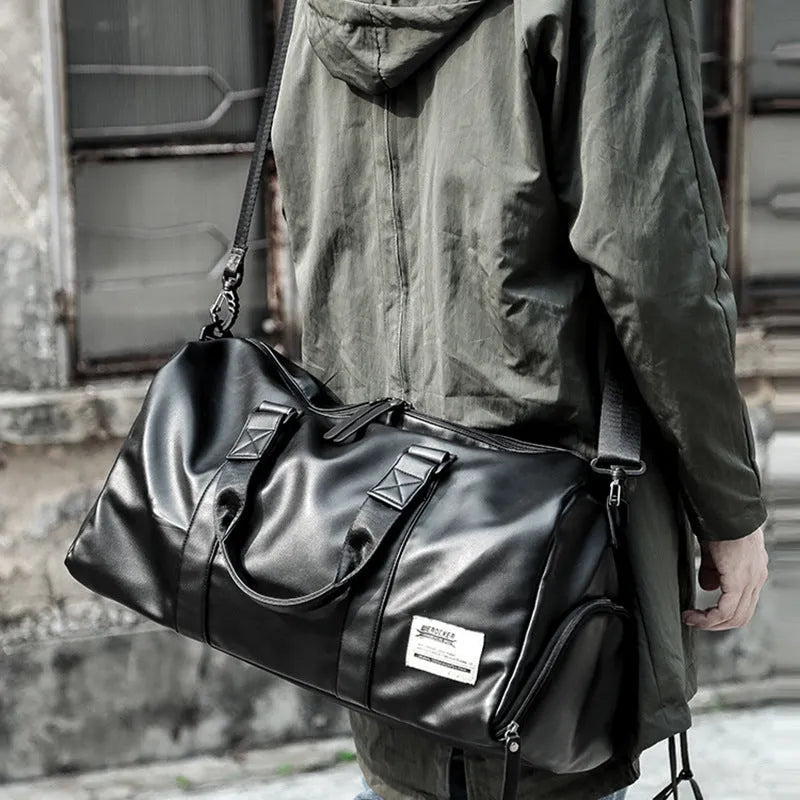 Large black waterproof PU leather sports training bag with zipper showing side view and multiple pockets