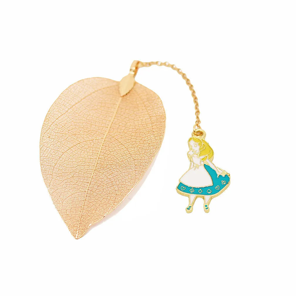 Metal leaf-shaped bookmark with a choice of Alice, rabbit, or clock charm designs on kraft card.
