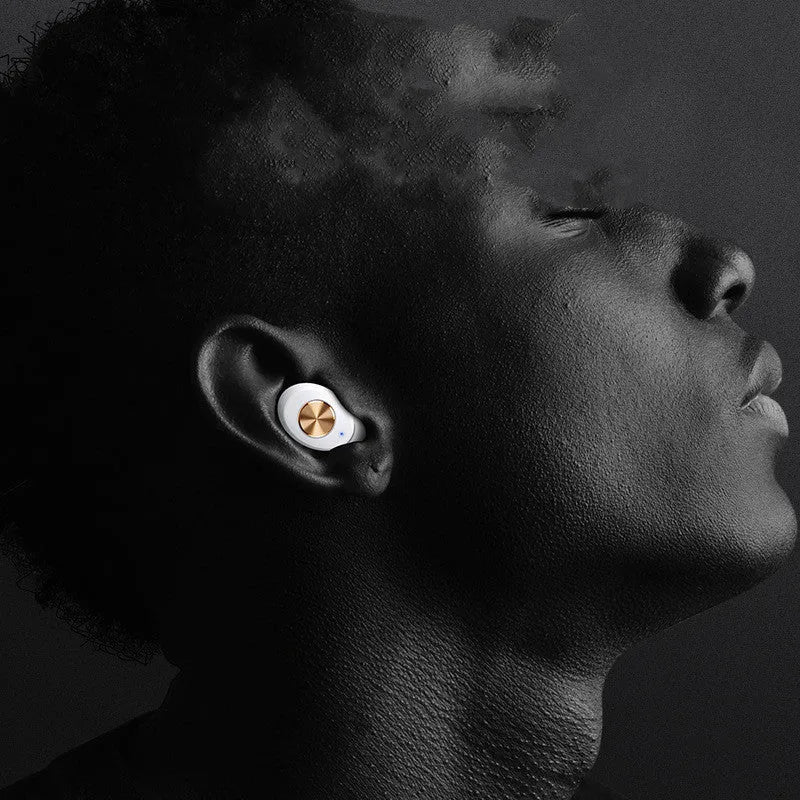 White Pebble Series Wireless Bluetooth TWS earbuds next to their compact charging case