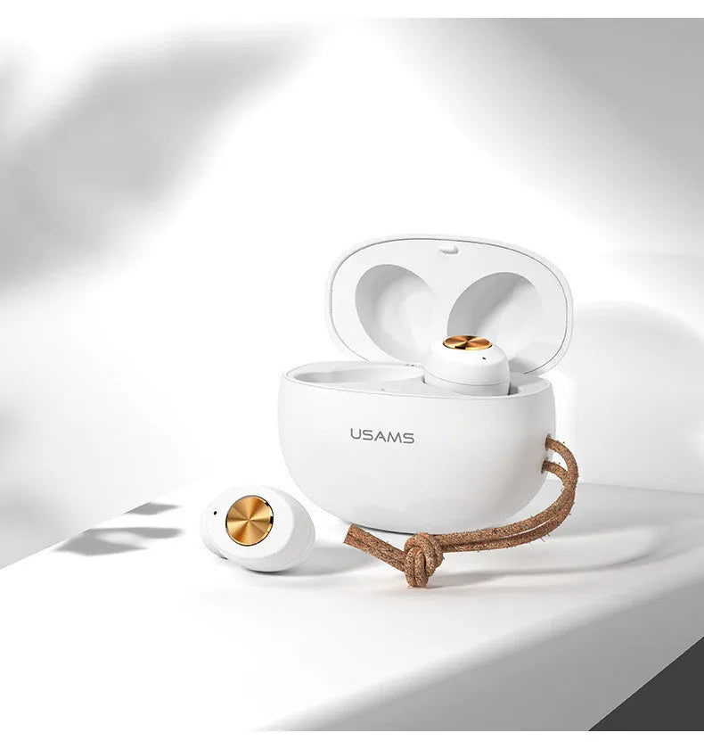 White Pebble Series Wireless Bluetooth TWS earbuds next to their compact charging case
