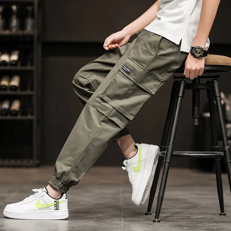 Harlan overalls cropped trousers in loose fit, plain pattern, pocket decoration, army green colour