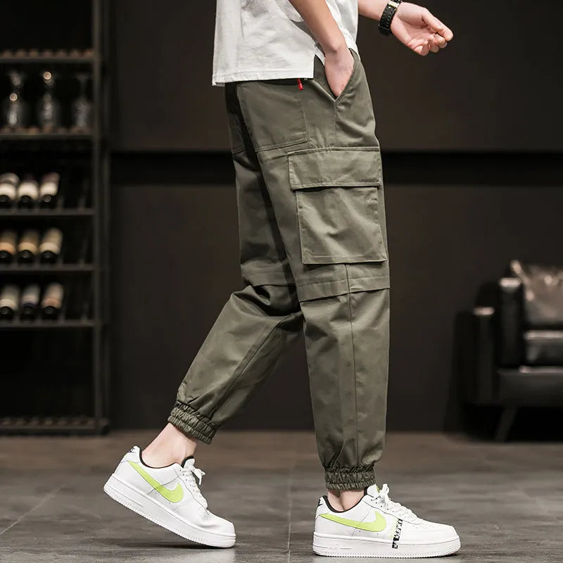 Harlan overalls cropped trousers in loose fit, plain pattern, pocket decoration, army green colour