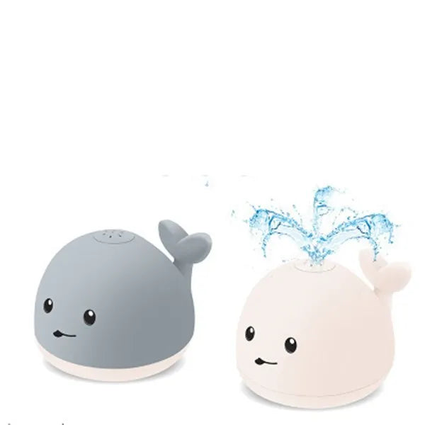Grey or white whale bath toy floating in water with LED lights and water spray fountain