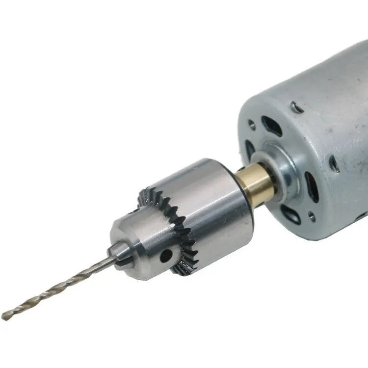 Hard alloy electric drill chuck with 3.17mm tail hole and sleeve on a white background.