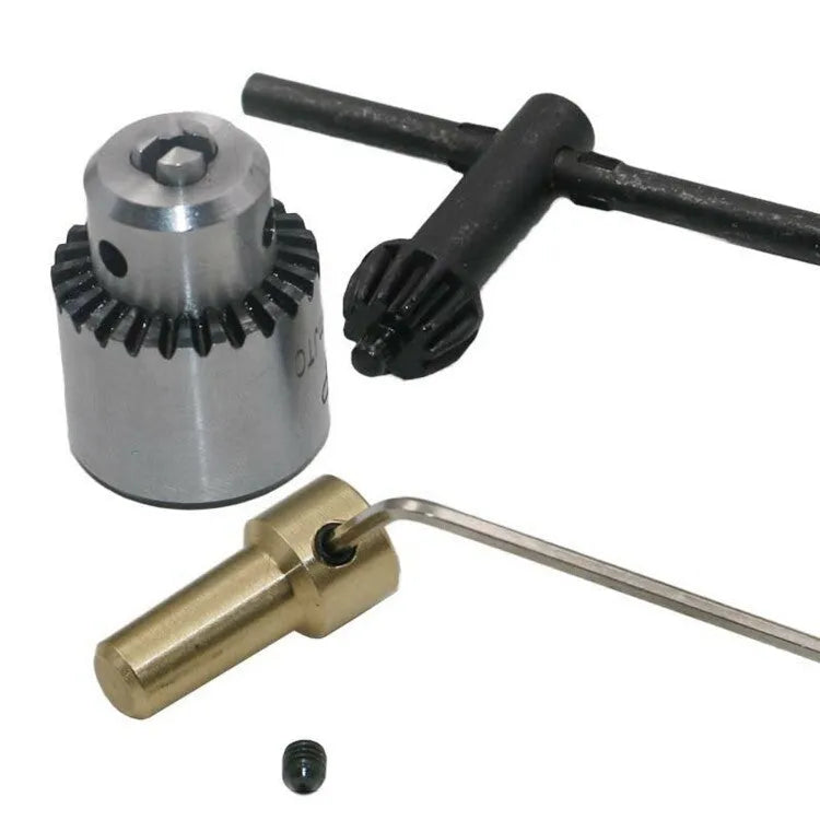 Hard alloy electric drill chuck with 3.17mm tail hole and sleeve on a white background.