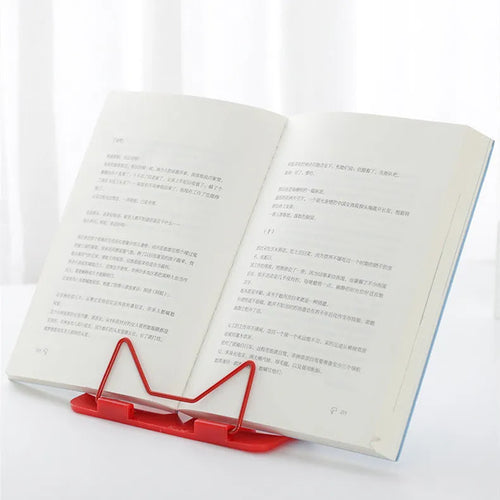 Adjustable metal and plastic reading frame in blue colour, holding book upright