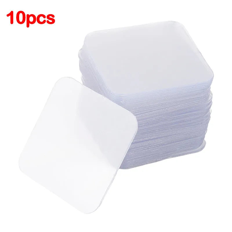 Ten transparent 6cm square double-sided adhesive patches for strong permanent mounting