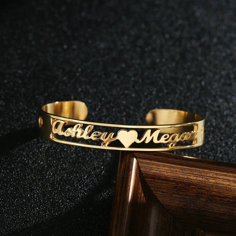 Customised name bracelet in stainless steel with silver finish and 10mm width on display
