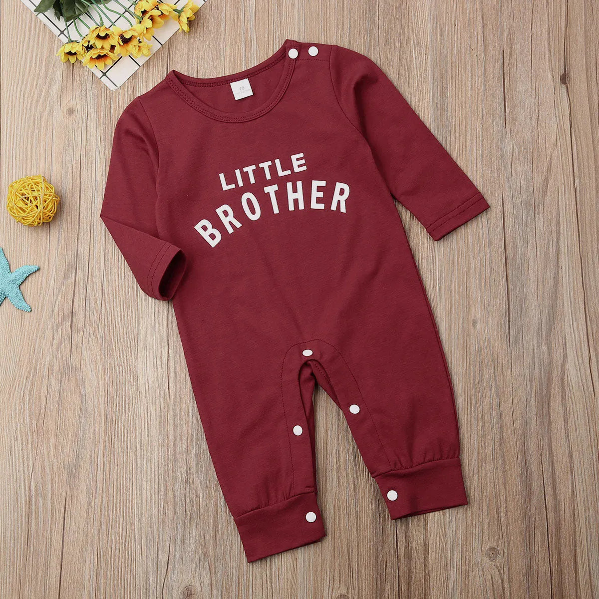 Male Alphabet long sleeved romper for newborn baby in cotton, black colour, sizes 70-100