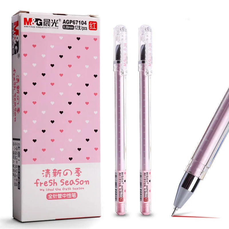 Syringe-style plastic pens with cartoon design in black, blue, and pink, shown in a 6-pen boxed set.