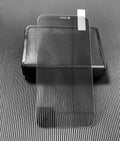 Tempered glass iPhone screen protector showing anti-fingerprint and scratch-resistant properties